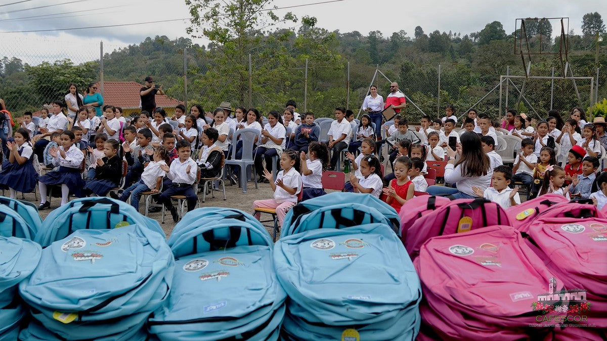 Rows of new backpacks ready for schoolchildren at a community event in Honduras