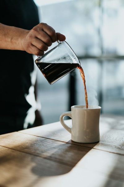 decaf coffee being poured into a mug