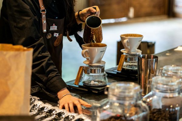 barista making coffee